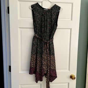 Cocktail dress. Looks great with a jacket. One of the belt loops is broken.